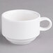 A Villeroy & Boch white porcelain cup with a handle on a gray surface.