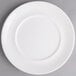 A Villeroy & Boch white porcelain flat plate with a white rim.