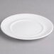 A white Villeroy & Boch porcelain plate with a rim.