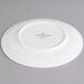 A Villeroy & Boch white porcelain flat plate with a white rim.