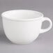 A Villeroy & Boch white porcelain cup with a white handle.