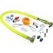 A yellow T&S Safe-T-Link gas appliance connector hose with other parts and tools.