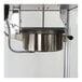 A stainless steel Paragon Theater Pop popcorn pot with a black handle.