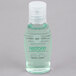 A clear bottle of Dial Restore body wash with clear liquid inside.