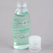 A close-up of a Dial Restore Body Wash bottle.