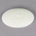 A white oval Dial soap bar with text on it.