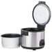 An Avantco commercial electric rice cooker with a white pot and lid with a black rim.