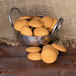 A bowl of Nabisco Nilla Wafer cookies on a table.