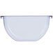 A clear plastic bowl with a curved edge and a handle.