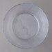 A clear plastic container with a circular lid.