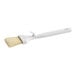 A white Carlisle Sparta Spectrum pastry brush with a curved white plastic handle.