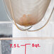 A Matfer Bourgeat Exoglass metal strainer with a metal mesh.