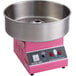 A Carnival King pink cotton candy machine with a stainless steel bowl.