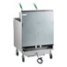 A large silver metal Frymaster gas fryer system on wheels.