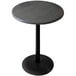 A Holland Bar Stool round outdoor bar height table with a black metal base.