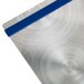 A Menu Solutions Alumitique aluminum menu board with navy blue bands on a metal surface.