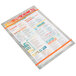 An Alumitique menu board with orange bands on a table in a Mexican restaurant.