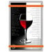 A Menu Solutions brushed aluminum menu board with orange bands on a wine glass.