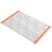 A white rectangular aluminum menu board with orange swirls on the border.