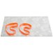 An Alumitique menu board with orange rubber bands on white paper.