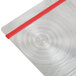 A close up of a Menu Solutions Alumitique aluminum menu board with red bands on the table.