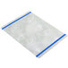 A white rectangular object with blue bands.