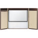 A white rectangular conference cabinet with a black border and a brown interior with a white markerboard inside.