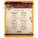 An orange customizable acrylic Menu Solutions board with black rubber bands.