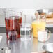 A Cambro measuring cup set on a kitchen counter.