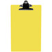 A yellow Menu Solutions clipboard with a black clip.