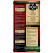 A red Menu Solutions menu board on a table in a farm-to-table restaurant.