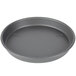 A round black Chicago Metallic deep dish pizza pan.