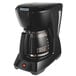 A black Hamilton Beach coffee maker with a glass pot.