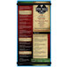 A blue Menu Solutions acrylic board with rubber bands holding a menu