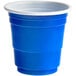 A blue plastic cup with a white rim.