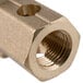 A brass Duck Mouth Burner orifice with a threaded nut.