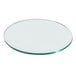 A clear tempered glass round riser shelf.