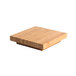 A Rosseto natural bamboo square cap on a table.