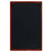 A mahogany wooden menu board with picture corners on a table.