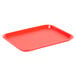 A red plastic Choice fast food tray.