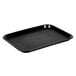 A black plastic Choice fast food tray on a counter.