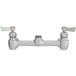 A silver Fisher wall mount faucet base with swivel stems and lever handles.