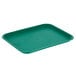 A teal plastic Choice fast food tray on a white background.