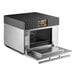 An ACP XpressChef 4i high-speed countertop oven with a black and silver metal box and a touch screen display.