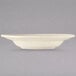 A white bowl with a rim on a gray background.