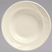 A white Libbey china soup bowl with a swirl design on the rim.
