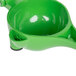 A green zinc alloy bowl with a handle.