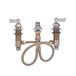 A Fisher widespread faucet base with swivel stems and lever handles.