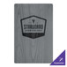 A grey wood sign with a black logo for Menu Solutions.
