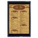 A Menu Solutions wood menu board with top and bottom strips.